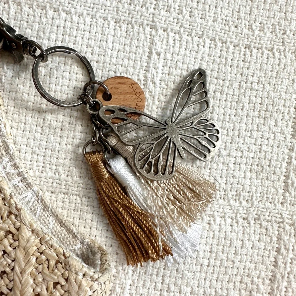 Sakroots Roma Straw Canvas Floral Boho Shoulder Bag Butterfly Charm Tan Medium